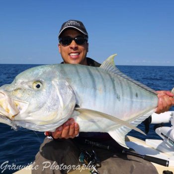Well known Real Estate agent and auctioneer Michael Choi with a lovely Hervey Bay Golden trevally